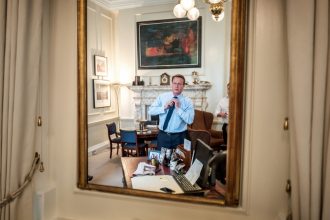 21/6/2016. Two days before the referendum that will define his tenure as British Prime Minister, David Cameron adjusts his tie in his office in Downing Street.  © Charlie Bibby