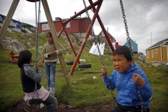 2/7/2009. Inuit children play in a settlement near Ilulissat, Greenland. © Charlie Bibby 