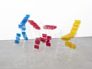 16. Composition with three drying racks (blue, red, yellow) 2019 