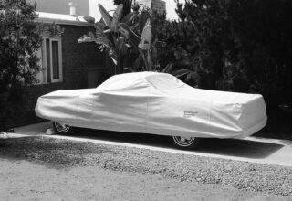 Covered car in drive, 1987 © Stephen Clarke