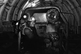 Engine Driver, Littleton Colliery, The West Midlands UK 1977 from ‘Coal Mining in the West Midlands’© Janine Wiedel