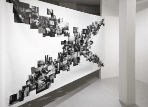 Overview of Edition II of the Abysm, presented as a single page from a book, dividing the entire length of one room at Elysium Gallery, Swansea, UK