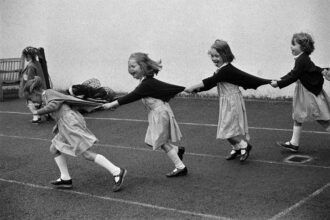 Girls running in the playground, Francis Holland Lower School, London (1988)