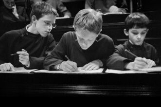 Three choristers during the rehearsal at Durham Cathedral (2000)