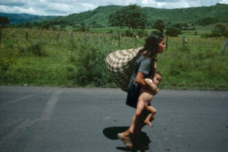NICARAGUA. Esteli. September 20, 1978. Fleeing the bombing to seek refuge outside of Esteli. The Nicaraguan National Guard captured the city of Esteli which was held by Sandinesta rebels. © Susan Meiselas/Magnum Photos