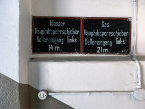 Bernburg: Gas and water valve notices on steps to T4 basement and gas chamber © Richard Wood