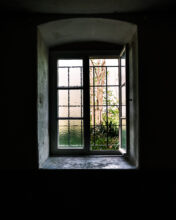 Pirna Sonnenstein: View to hillside mass grave site from gas chamber window © Richard Wood